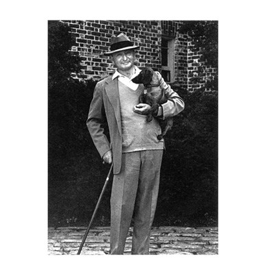Carl M. Loeb with the family dachshund